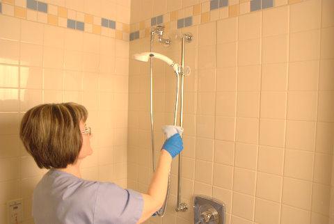 Rinse thoroughly using the shower spray if possible. D. Dry all surfaces carefully to prevent slips and falls. E.