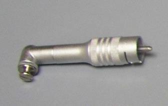 C) The chuck is then turned to the left (counter-clockwise) so that the markings on the handpiece line up.