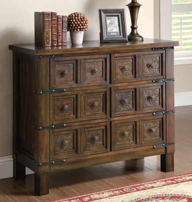With a two-tone rubbed through finish, this piece features two top drawers and two doors for plenty of storage space.