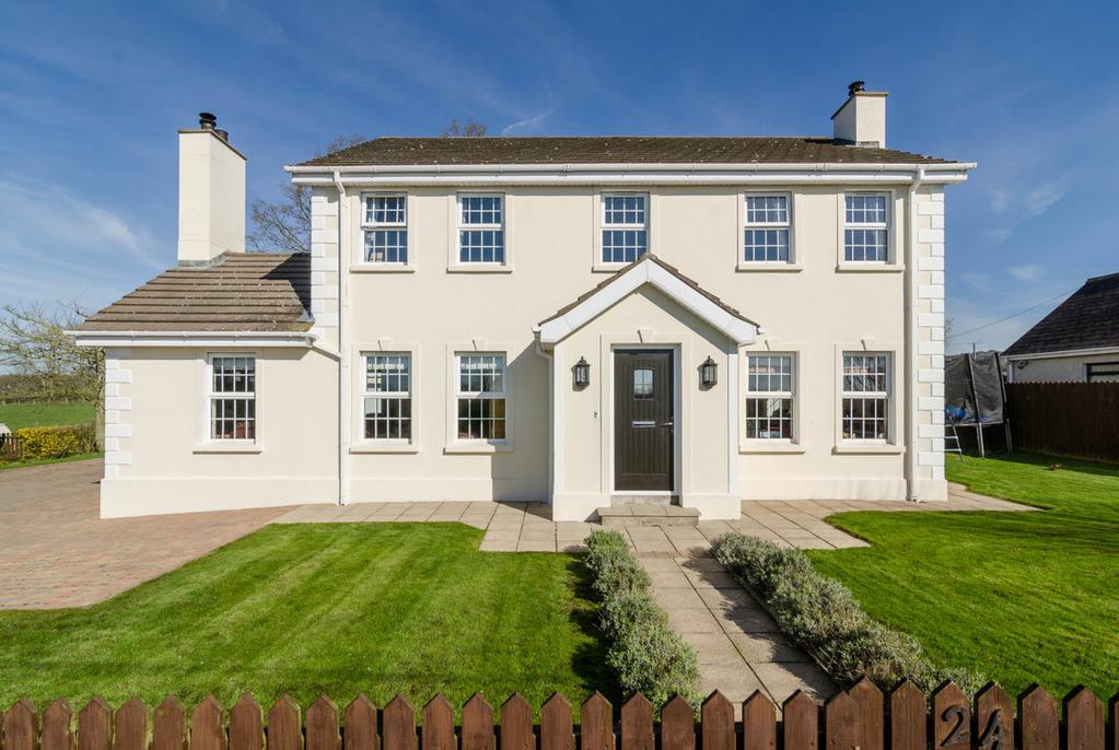 This attractive detached villa has been designed and finished to an extremely high specification and is situated on an excellent site, combining the benefits of countryside rural life and offering