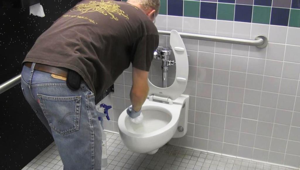 On toilets and urinals make sure to clean all areas including under the