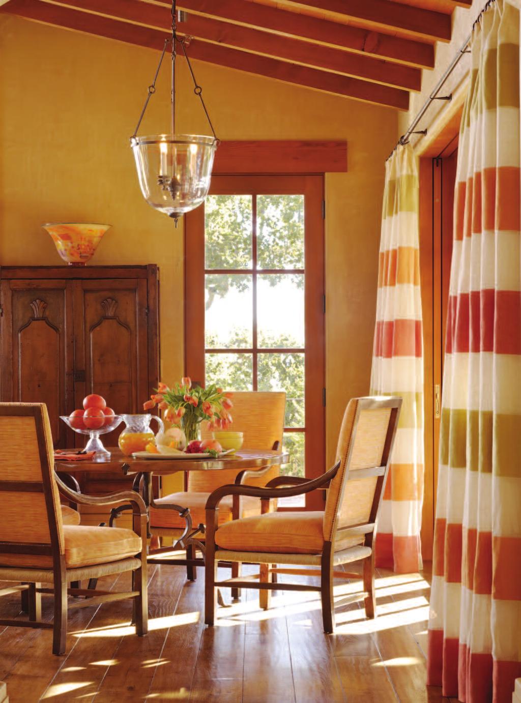 The sunlit game room doubles as a casual seating area for morning breakfast.