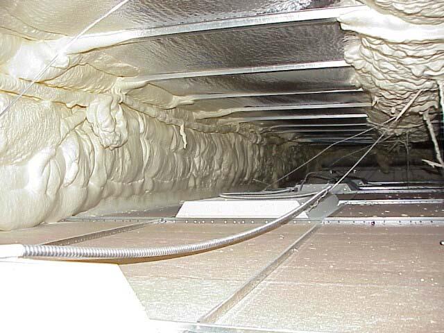 Figure 12 Attic space after foam was installed It can be seen along the bottom of the truss pints/day (80oF - 60% RH) and draws 6.8 amps on a 115-volt circuit.