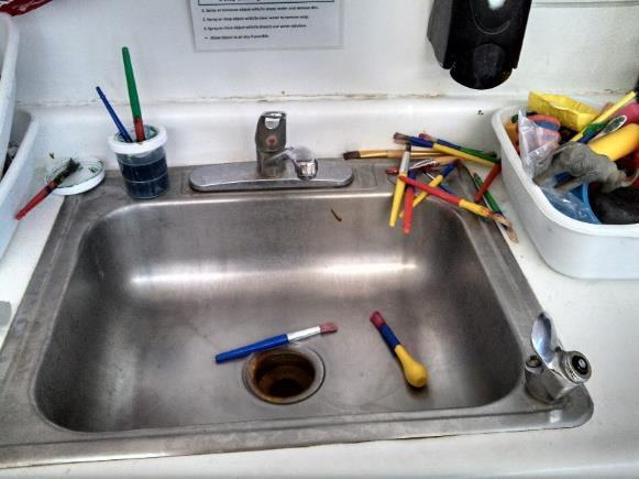DO NOT leave art supplies in the sink area.