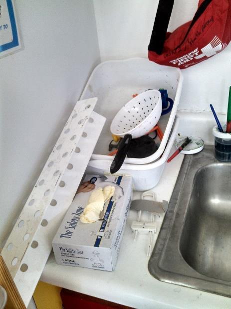 Toothbrushes are stored in the toothbrush holder.