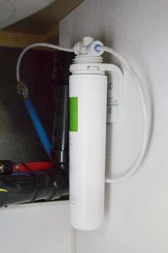 SECTION 7 PLUMBING Ice Maker Filter Assembly (Located below galley sink) -Typical Installation Replacing the Ice Maker Filter Cartridge The filter cartridge must be replaced at least every 12 months.