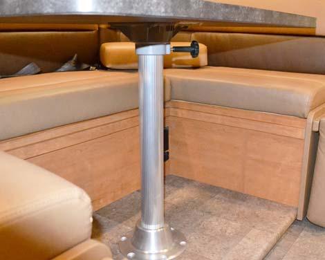 SECTION 9 FURNITURE AND SOFTGOODS DINETTE FLIP-UP FOOTRESTS (Typical View Your coach may differ in appearance) 1. To Extend: Pull footrest up until it locks into position. 2.