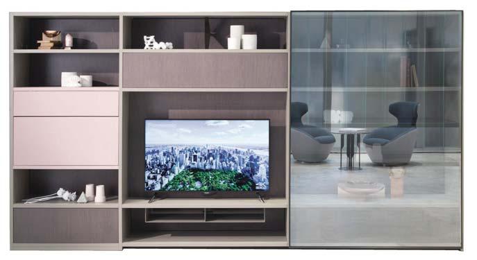 television. On either side, the horizontal section is accentuated by two glazed display units (one small square and one long), and the vertical section features a different colour.