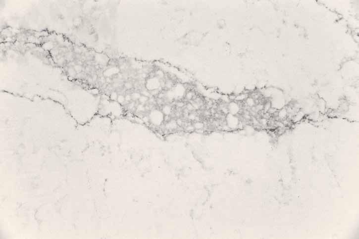 5131 Calacatta Nuvo A symphony of wide, elegant, cascading grey veins on an opaque creamy white base.