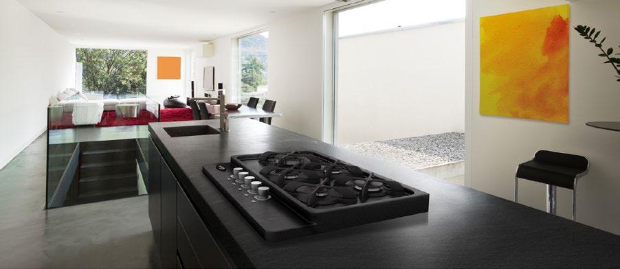 THE PRAMAR STONE LUXURY KITCHEN PROJECT WITH INTEGRATED HOB FEATURING THE SAME MATERIAL AS TOPS INNOVATION PRAMAR, a little family-run business founded on 1963, leader in household appliance