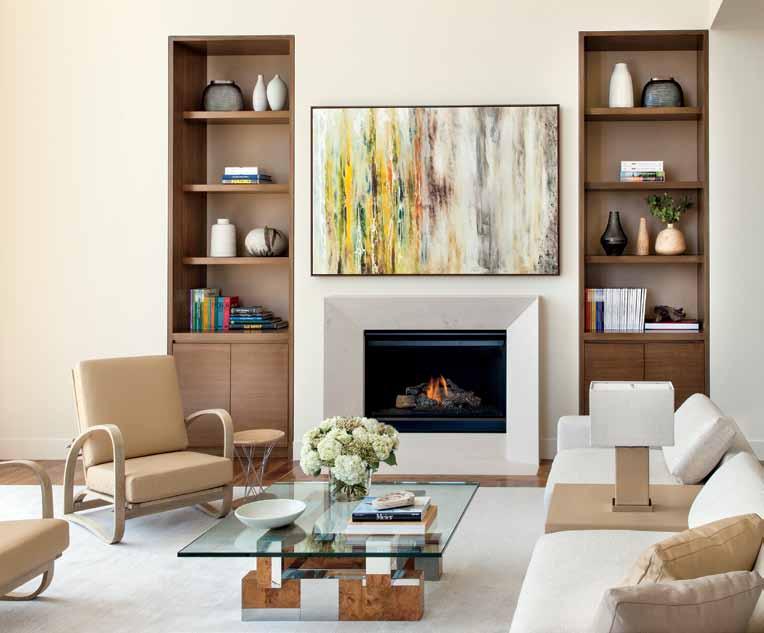 My job was to take those elements and make them feel cohesive. Eisner designed sleek leather-backed cabinetry, fabricated by Fort Hill Construction, for the living room.