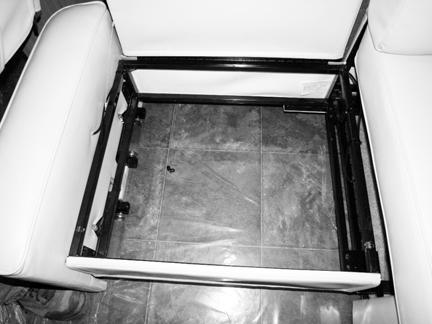 Turn seat cushion over and reinstall onto sectional frame, ensuring the four engagement