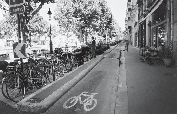 96 Anne C. Lusk Figure 2 European cycle track for bicyclists in Paris, France. (Photo by Anne Lusk.) considered wheeled pedestrians (figure 2).
