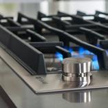 Pro-Style P Stainless Single point electronic ignition and Flame-Sensing re-ignition Three 15,000 BTU burners 5 sealed brass burners Low-profile design enables near-flush installation Gas Cooktops