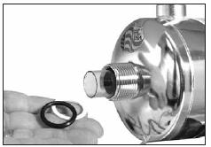 2) Unscrew the static gland nuts from each end of the chamber. Avoid striking the quartz sleeve with the static gland nut.