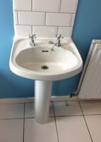 924224534764846 Bath/Shower White bath with a white tile outer, metal mixer tap