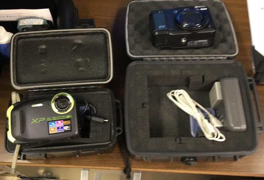 Mead, personal communication, January 19, 2016). Figure 5. Various cameras used for photographing a fire-related incident.