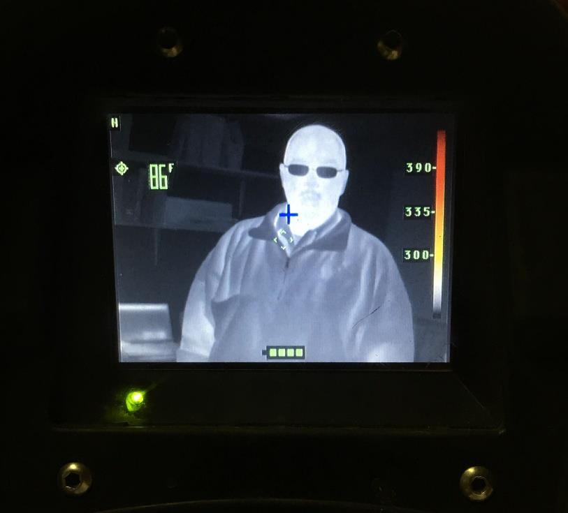 Figure 6. A person shown with a thermal imaging camera. Maps (See Figure 7) are used to see accessible water mains within cities.