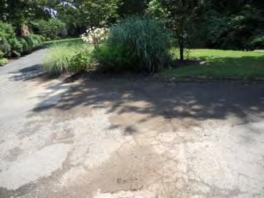 Pervious pavement at end of street could be implemented to limit water flow into the stream along with buffer enhancement.