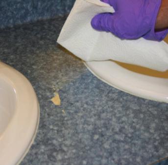 Cleaning Minor Spills on Hard Surfaces cont. 5 Begin pre-cleaning the spill.