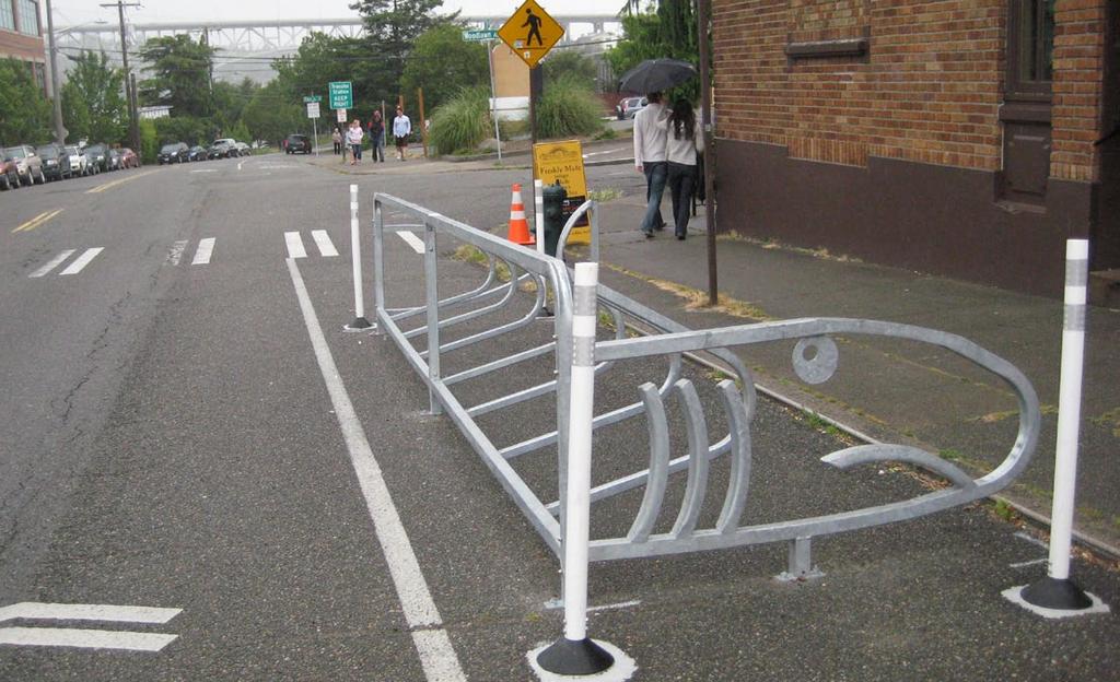 Bicycle Racks Bicycle racks are an important element of the streetscape, both as an aesthetic aspect of the streetscape and as a functional element for those who travel by bike.
