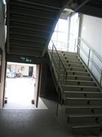 14 Nov 2013 Handrails are provided on both sides of each stairway. Intermediate handrails are provided when the stair width exceeds 2.2 m (87 in.). Handrails are not mounted lower than 760 mm (30 in.
