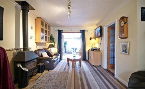 Accommodation includes entrance porch, separate WC, lounge, kitchen, conservatory, bathroom and three bedrooms whilst also boasting parking for two cars and