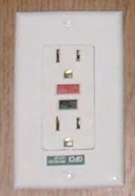 ELECTRICAL FEATURES Ground-Fault-Circuit-Interrupt (GFCI) Receptacles In the kitchen and bath areas, there are 120 VAC GFCI receptacles (Figure 7-14) which provide greater protection against
