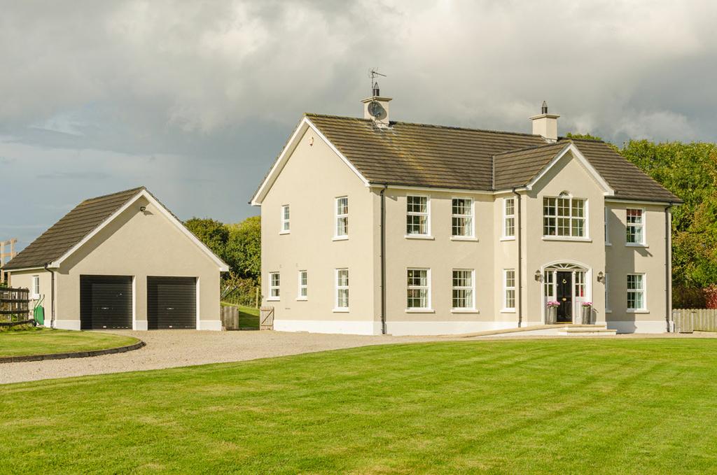 This attractive detached villa has been designed and finished to an extremely high specification and is situated on an excellent site, combining the benefits of countryside rural life and offering
