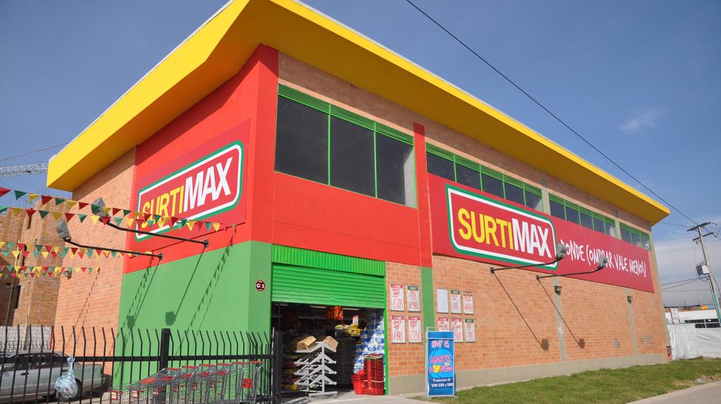 Almacenes Éxito S.A. Consolidated Financial Results 2011 For the quarter and twelve-month period ended December 31, 2011 The New Surtimax La Paz Bosa store.