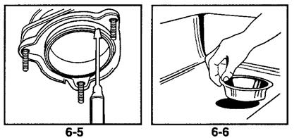 3 DISASSEMBLE NEW DISPOSER - MOUNTING ASSEMBLY 1. Insert wrenchette (or screwdriver) into one mounting lug and hold lower mounting ring securely with one hand (see Figure 3-1).
