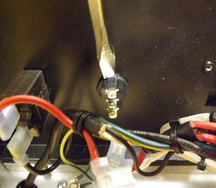 Locate the switch wiring inside the control panel mounted in the cabinet (.) 3.