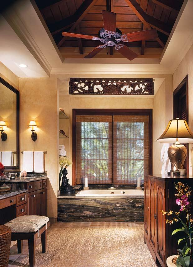 BIRD OF PARADISE Below: The master bath includes a vanity, a whirlpool tub and a coffee bar, at right.