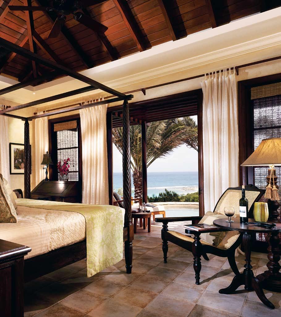 The master bedroom, housed in its own freestanding, air-conditioned pavilion, steps out to a private plunge pool overlooking the ocean.