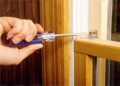 Install a simple pin or nail into to the frame to stop it from opening.