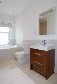 84m) Comprising Jacuzzi bath with shower attachment, walk-in tiled shower