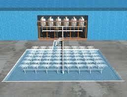 A natural-draft cooling tower Wet Cooling Towers The idea of a cooling tower started with the spray pond, where the warm water is sprayed into the air and is cooled by the air as it falls