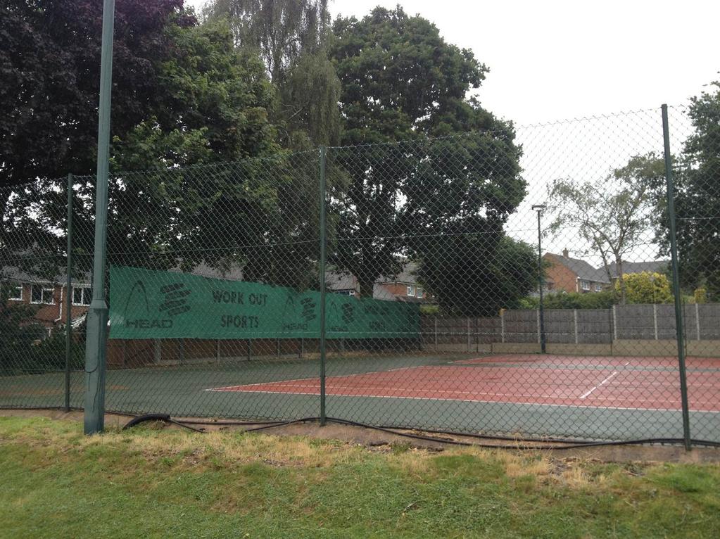 Photograph 4 Upper tennis court and