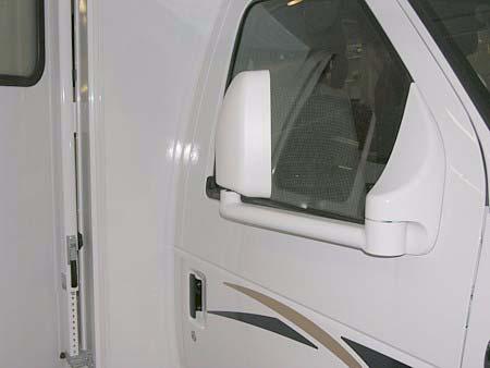 Center position is neutral to disable arrow buttons and prevent misadjustment of mirrors.