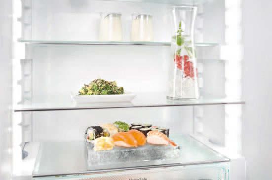 In the full freezer tower, transparent drawers on telescopic rails with safety glass shelf dividers efficiently organize the frozen foods kept FrostSafe with continual circulated air.