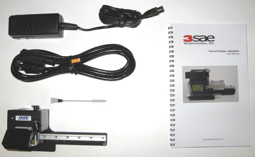 Components The standard Thermal Stripper kit contains the following items: Thermal Stripper unit A/C Power Supply and Cord Cleaning Brush User Manual Fiber