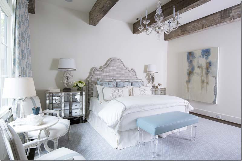 This bedroom is all soft blues and whites.