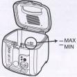 2. With basket removed, fill fryer base with vegetable oil to the MAX fill line, about 11 cups. See Diagram 2.