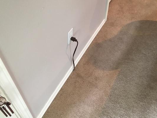 Electrical Observations: Wiring routed under carpet is not advisable and can be a potential fire hazard, recommend