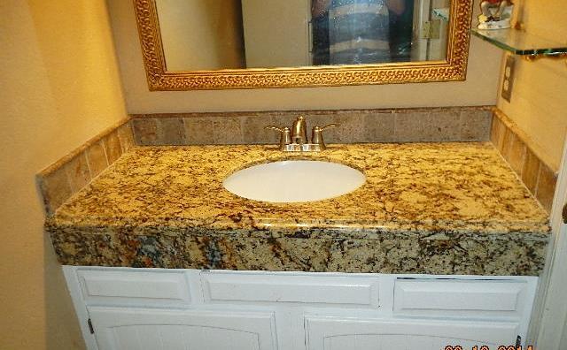 Stoneworks to install granite counter tops in my kitchen and two bathrooms and paid them a