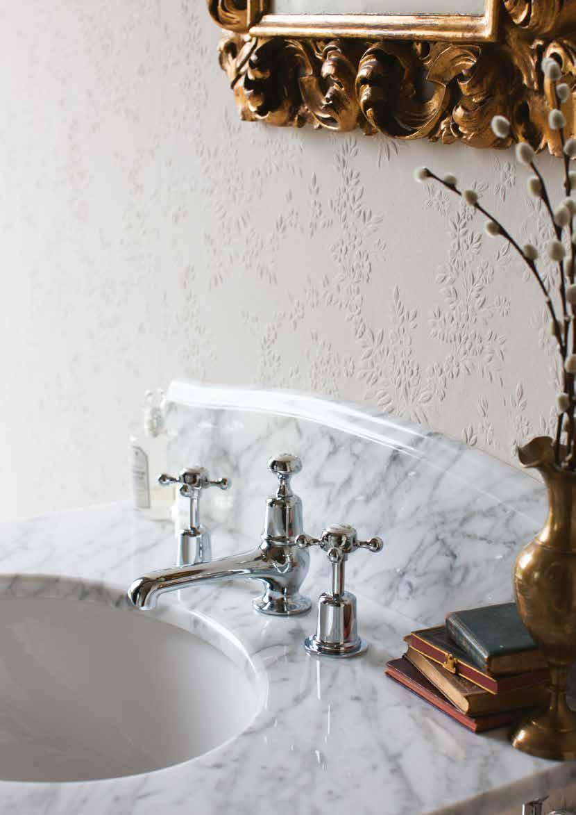 STONE BASINS Stone Carrara marble top and basin with chrome washstand with Claremont 3 tap hole basin mixer with pop-up waste.