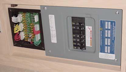 Another 12 VDC fuse panel (Figure 7-2) is located in the driver s side, external, front compartment; this panel is protected by a plexiglass shield to prevent accidental short-circuiting of the 12