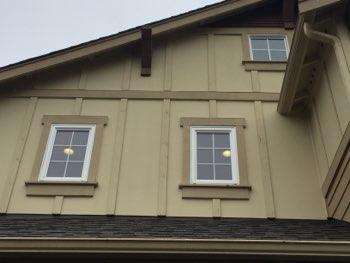 Cultured stone siding Paint flaking at south window trim 2.