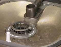 Lift fine strainer out and repair or replace as necessary.