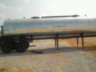 - Dryer drum with pollution control device on a double axle chassis.